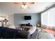 Bright and airy living room featuring modern furnishings, hardwood floors, and a ceiling fan at 3350 Cessna Dr, Columbus, IN 47203