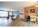 Open-concept living room and dining area with sleek hardwood floors and ample natural light at 3350 Cessna Dr, Columbus, IN 47203