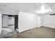 Unfinished basement area with open floor plan, storage cabinets, and neutral walls, ready for customization at 3609 N Keystone Ave, Indianapolis, IN 46218