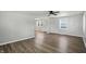 Open-concept living room with wood floors and neutral paint, perfect for entertaining at 3609 N Keystone Ave, Indianapolis, IN 46218