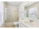 Well-lit bathroom features a shower-tub combo, a large vanity, and a bright mirror at 373 Austin Dr, Avon, IN 46123