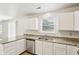 Bright kitchen features granite counters, stainless steel appliances, and white cabinets at 373 Austin Dr, Avon, IN 46123