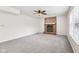 Spacious living room with a brick fireplace and large windows that offers lots of natural light at 373 Austin Dr, Avon, IN 46123