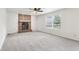 Spacious living room with a brick fireplace and plenty of natural light from the window at 373 Austin Dr, Avon, IN 46123