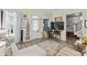Bright living room with large windows, stylish decor, and an open layout, perfect for modern living and gatherings at 38 W Main St, Brownsburg, IN 46112