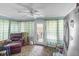 This is an inside look at the living room with unique flooring and plenty of natural light at 38 W Main St, Brownsburg, IN 46112