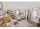Spacious living room with a variety of comfortable seating options and stylish accents, creating a welcoming atmosphere at 38 W Main St, Brownsburg, IN 46112