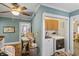 Picture featuring an interior room showing built-in cabinets and a laundry area with a washer and dryer at 38 W Main St, Brownsburg, IN 46112