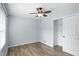 Bedroom showcasing wood floors and a closet with sliding doors at 4023 N Arlington Ave, Indianapolis, IN 46226