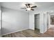 This bedroom features wood floors and a closet with sliding doors at 4023 N Arlington Ave, Indianapolis, IN 46226