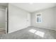 Vacant bedroom featuring carpeted floors, neutral walls, and a closet, ready for personalization at 452 N Fenton Ave, Indianapolis, IN 46219