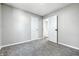 Bright unfurnished bedroom with carpet and two doors at 452 N Fenton Ave, Indianapolis, IN 46219