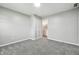 Inviting bedroom with soft carpet, natural light, and direct access to the en-suite bathroom at 452 N Fenton Ave, Indianapolis, IN 46219