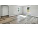 Well-lit room with neutral walls and flooring at 452 N Fenton Ave, Indianapolis, IN 46219