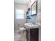 Modern bathroom with a stylish vanity, neutral walls, and ample lighting at 4625 Beth Ann Dr, Indianapolis, IN 46221