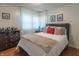 Comfortable bedroom with plush bedding, neutral tones, and ample natural light at 4625 Beth Ann Dr, Indianapolis, IN 46221