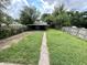 Large fenced backyard and two-car garage at 492 S Livingston Ave, Indianapolis, IN 46241