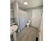 This bathroom features modern fixtures and neutral decor at 492 S Livingston Ave, Indianapolis, IN 46241