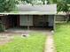 Two-car garage with extra parking in the backyard at 492 S Livingston Ave, Indianapolis, IN 46241
