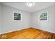 This bedroom features gleaming hardwood floors at 5407 Adelaide St, Indianapolis, IN 46203
