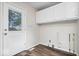 Mud room with modern flooring and access to backyard at 5407 Adelaide St, Indianapolis, IN 46203