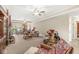 Open living room area features a fireplace and lots of natural light at 5659 Augusta Woods Dr, Plainfield, IN 46168