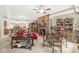 Inviting living room featuring a cozy fireplace, charming decor, and comfortable seating area at 5659 Augusta Woods Dr, Plainfield, IN 46168