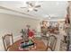Inviting living room features a dining table, fireplace, and open access to the kitchen at 5659 Augusta Woods Dr, Plainfield, IN 46168