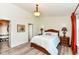 Cozy bedroom featuring a wood frame bed, bedside tables, and a neutral color scheme at 5765 White Pine Rd, Whitestown, IN 46075