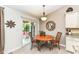 Cozy breakfast nook with sliding glass doors leading to the outdoor patio for dining al fresco at 5765 White Pine Rd, Whitestown, IN 46075