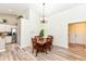 Cozy dining area features modern lighting and furniture at 5765 White Pine Rd, Whitestown, IN 46075