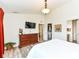 Serene main bedroom with hardwood floors, a walk-in closet, and plenty of natural light at 5765 White Pine Rd, Whitestown, IN 46075