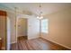 Cozy dining area next to kitchen area with window for natural light and new flooring at 6029 Sycamore Forge Dr, Indianapolis, IN 46254