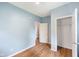Bedroom featuring hardwood floors, closet and natural light from the window at 615 Udell St, Indianapolis, IN 46208