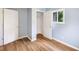 Bedroom featuring hardwood floors, closet and natural light from the window at 615 Udell St, Indianapolis, IN 46208