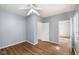 Serene bedroom featuring hardwood floors, ceiling fan and lots of natural light at 615 Udell St, Indianapolis, IN 46208