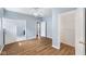 Bright bedroom with wood floors, ceiling fan, and walk-in closet at 615 Udell St, Indianapolis, IN 46208