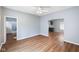 Spacious living area features hardwood floors and neutral paint tones at 615 Udell St, Indianapolis, IN 46208