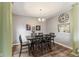 A spacious dining room with dark wood furniture, perfect for gatherings and Gathering meals at 619 Cahill Ln, Indianapolis, IN 46214