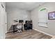 Bright office space with wood-look floors, providing a functional and stylish workspace at 619 Cahill Ln, Indianapolis, IN 46214