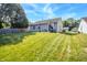 Spacious backyard featuring a lush lawn with a back patio, great for relaxation and outdoor activities at 740 Springmill Dr, Mooresville, IN 46158