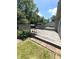 Back deck area featuring a charcoal grill and a small privacy fence at 8425 Brook Pointe Ct, Indianapolis, IN 46234