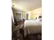 Bedroom featuring wood floors and natural lighting at 8425 Brook Pointe Ct, Indianapolis, IN 46234