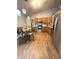 Well-lit kitchen and eating area featuring stainless steel appliances and wooden cabinets at 8425 Brook Pointe Ct, Indianapolis, IN 46234