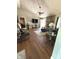 Cozy living room with a brick fireplace, vaulted ceilings, and lots of light at 8425 Brook Pointe Ct, Indianapolis, IN 46234