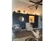 Cozy seating area adjacent to kitchen, with a peek-through window and neutral decor at 8425 Brook Pointe Ct, Indianapolis, IN 46234