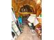 Interior of a well-utilized shed with storage and various gardening/household items at 8425 Brook Pointe Ct, Indianapolis, IN 46234