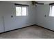 A simple bedroom with neutral carpet and white walls, offering a blank canvas for personalization at 9138 E 18Th St, Indianapolis, IN 46229