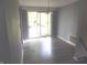 Inviting dining area featuring sliding glass doors to the backyard and new floors at 9138 E 18Th St, Indianapolis, IN 46229