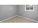 Comfortable bedroom featuring plush carpeting, a window, and ample closet space at 9319 Rochelle Dr, Indianapolis, IN 46235